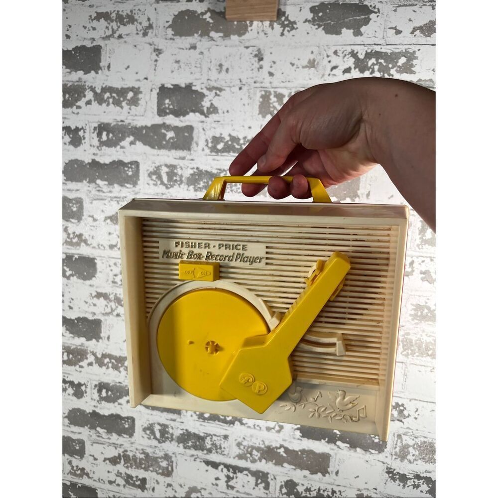 Fisher Price | kids vintage record player with records